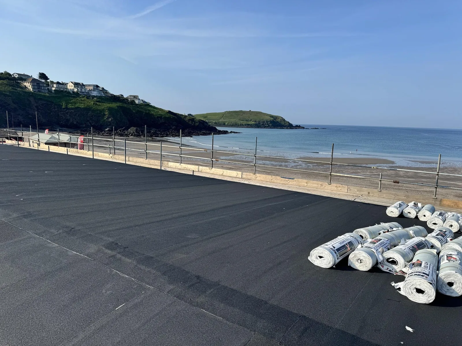 Flat roof membrane installation on a coastal property